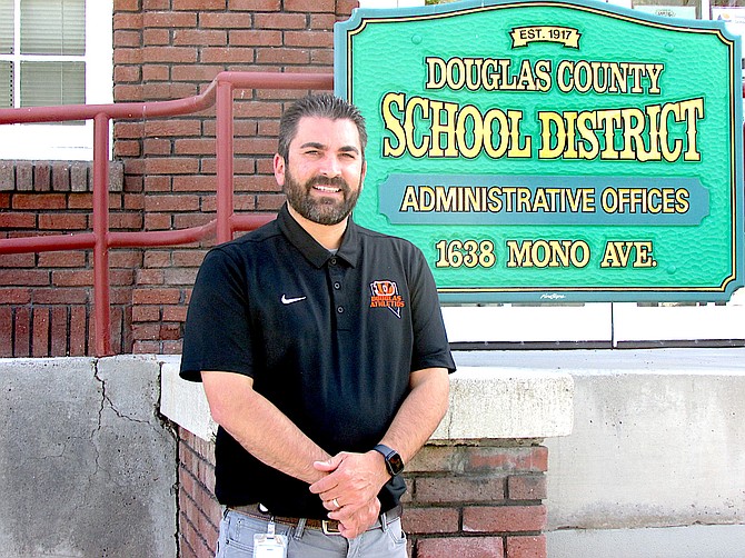 New Douglas County Superintendent Frankie Alvarado in front of the historic former Minden school that serves as the district's headquarters.