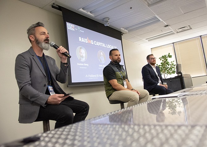 Juston Berg with EDAWN, Chris Myers with Holland and Hart, and Clint Vernon, founder and CEO of MassageDesk (far right), lead a discussion during the inaugural Reno Startup Week.