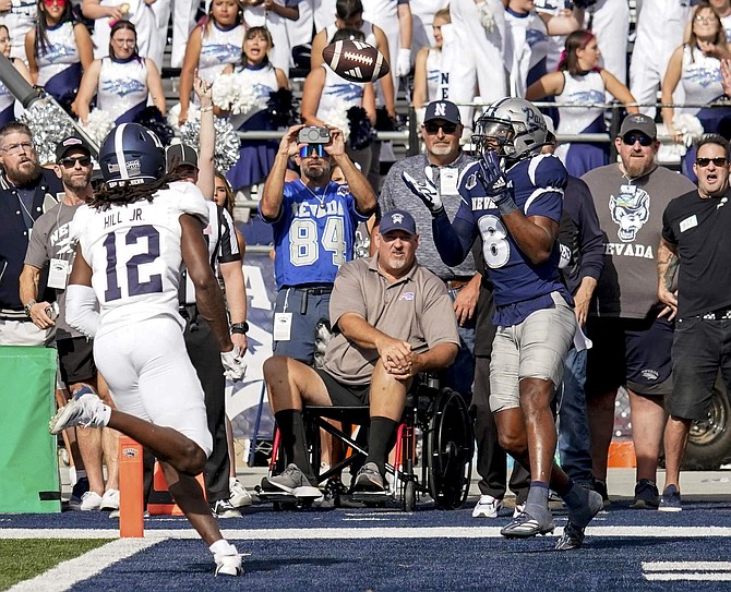 Nevada's Cortez Braham Jr. hauls in a touchdown pass against Georgia Southern on Saturday at Mackay Stadium.