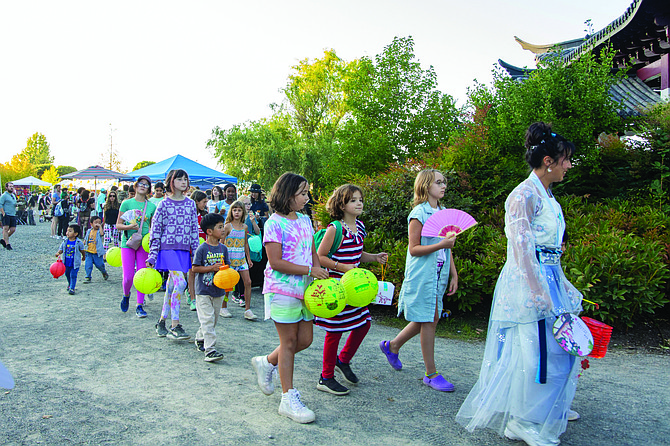 The Moon Festival lantern parade led by the Moon Princess is a favorite among children.