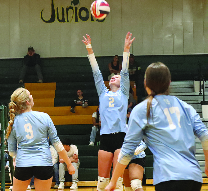 Oasis Academy’s Reese Laca dishes up an assist against Battle Mountain.