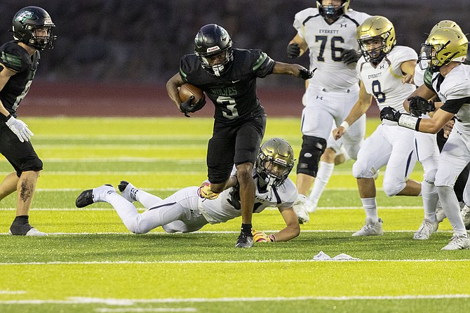 Jackson High School running back Tre Austin runs with the football during the Everett Seagulls-Jackson Timberwolves game Sept. 6 at Everett Memorial Stadium. The T’wolves took a 44-26 win. This week, Jackson’s up against Lake Washington at an away game and the Everett Seagulls host Shorecrest. Everett High’s game against Shorecrest starts at 5 p.m. Friday, Sept. 13 at Everett Memorial Stadium for an in-conference Wesco 3A match.