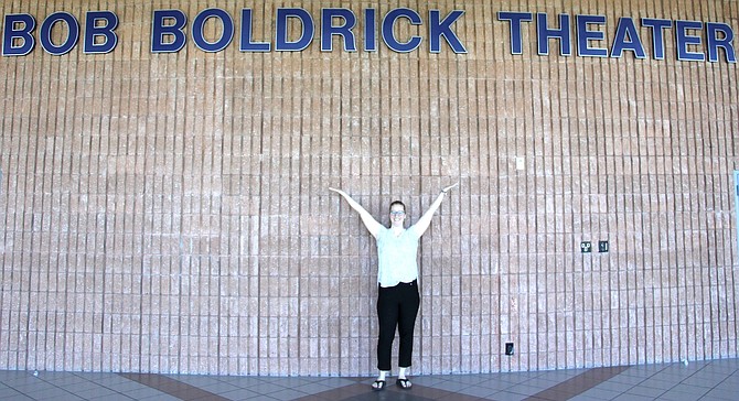 Anna Freeman, Carson City’s arts and culture supervisor, in the lobby of the Carson City Community Center in front of the Bob Boldrick Theater on Wednesday.