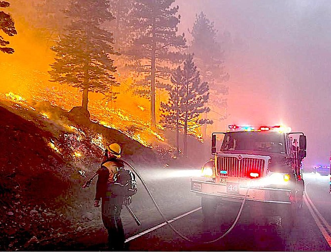 Overnight work near Mount Rose Highway to upgrade lines ahead of today's critical fire danger. Photo by US Forest Service