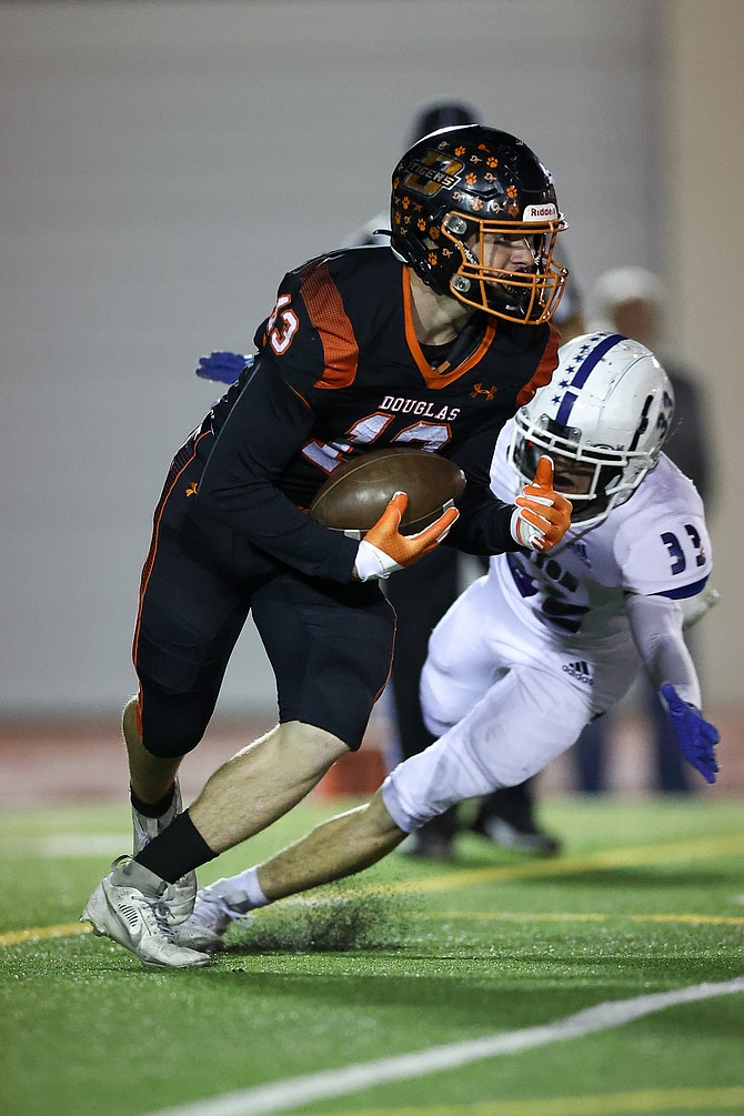 Douglas High’s Brenton Weston (13) against Carson in Minden in 2023. Friday’s edition of The Rivalry will be the first time in 15 years both teams enter with records above .500.