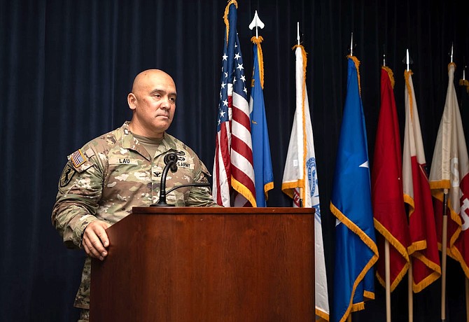 Col. Randy Lau of Dayton addresses the audience Sept. 8, 2024 after assuming command of the Nevada Army National Guard’s land component.