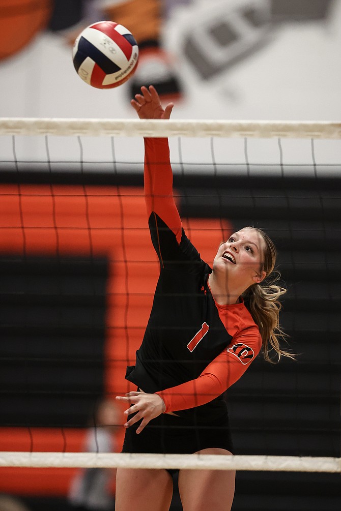 Douglas High’s Parker Estes goes up for one of her team-high 13 kills in a win over Galena on Thursday. It marked the second league win for the Tigers this season.