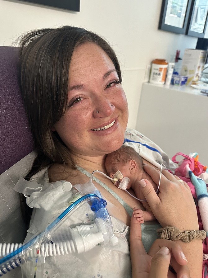 Lauren Olivares with her infant daughter Ruby May.