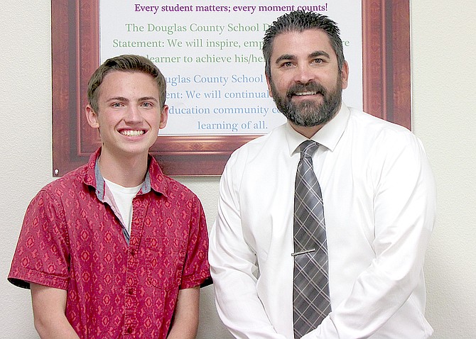 Douglas High School senior Ender Dempsey and Superintendent Frankie Alvarado during the Sept. 10 school board meeting. Dempsey was selected as the first student representative for the school board.