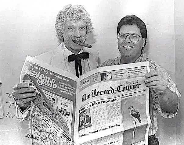 McAvoy Layne and Guy Clifton hold the first weekend edition of The Record-Courier, published Nov. 26, 1989. The note says, “Mac, The legends live on. Guy, March 30, 1990.” The photo was likely taken by R-C photographer Chris Tumbusch and was posted to Clifton’s Facebook Page.