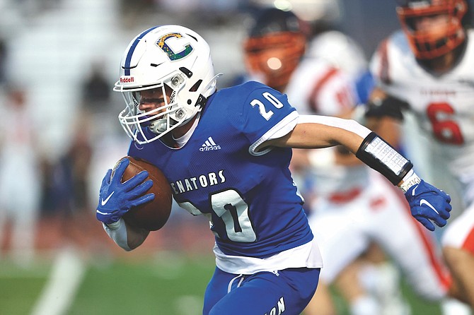 Carson High’s Jake Weninger (20) breaks up field against Douglas on Friday. Weninger and the Senators open 5A North-Division III play this Friday at home against Hug.