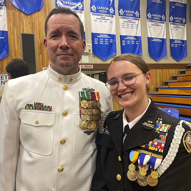 Carson High School NJROTC instructor Sr. Chief Jerry Skirvin and Battalion Commander Neva Mellow.