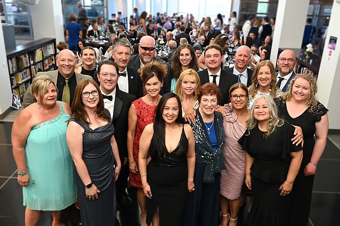 The Western Nevada College Foundation board of trustees poses with WNC President J. Kyle Dalpe and Foundation Executive Director Niki Gladys at the 2024 Reach for the Stars Gala.