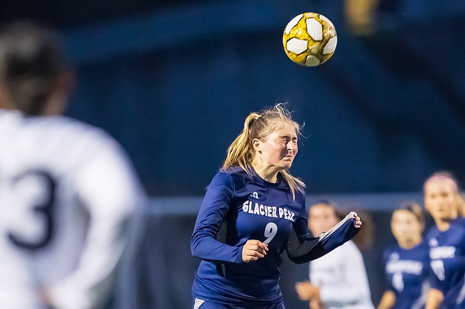 Glacier Peak Grizzly midfielder Dylan Gordon, a junior,  takes a header during the Grizzlies’ 9-0 win over Mariner High School on Thursday, Sept,.12 at Glacier Peak’s field. Four of Glacier Peak’s goals happened within the first 15 minutes of the game.