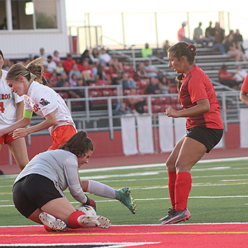 Lily Anderson-Burt makes one of many saves against the visiting Fernley Vaqueros.