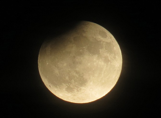 Topaz Ranch Estates resident John Flaherty captured this partial eclipse of the Harvest Moon on Tuesday night.