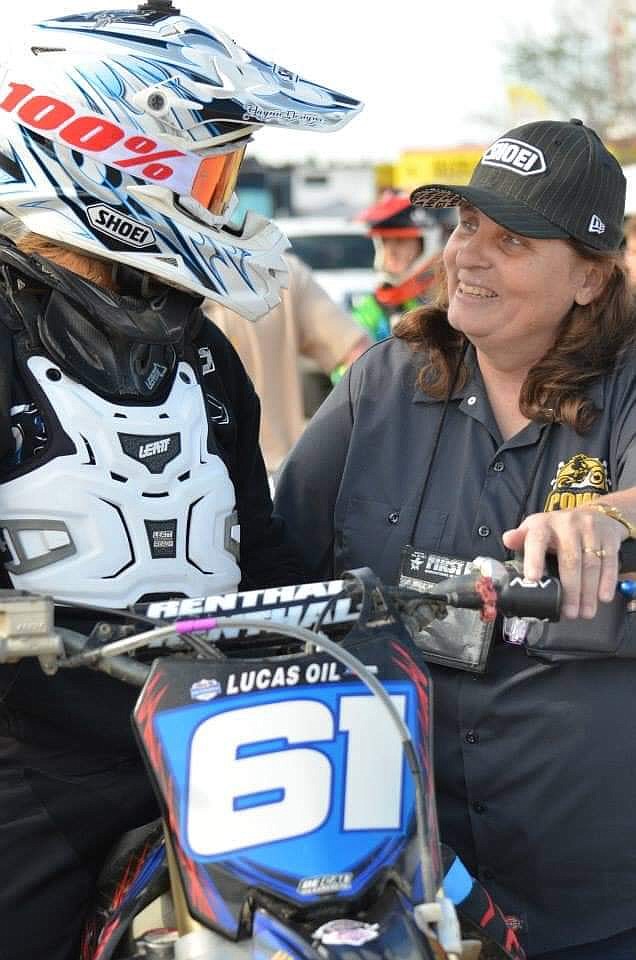 Debbie Matthews, right, instructs a rider. Matthews will go into the AMA Hall of Fame in early October. Matthews holds the record for longest consecutive professional and amateur career in women’s motocross after racing for 27 years.