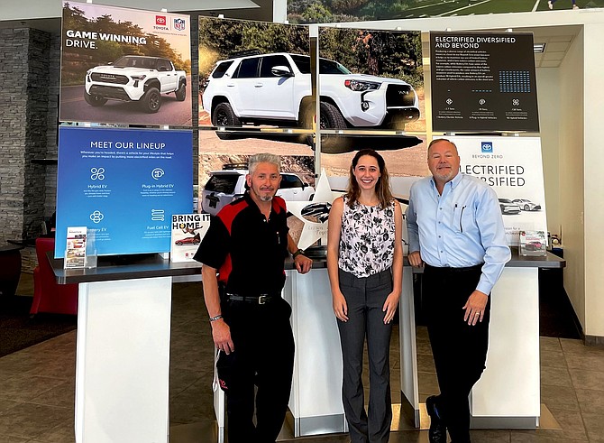 From left, Hugo Chavez of the Carson City Toyota facilities department, Erica Gallegos, program coordinator for Nevada Green Business Network, and Cliff Sorensen, director of Campagni Auto Group, at Carson City Toyota on June 25.