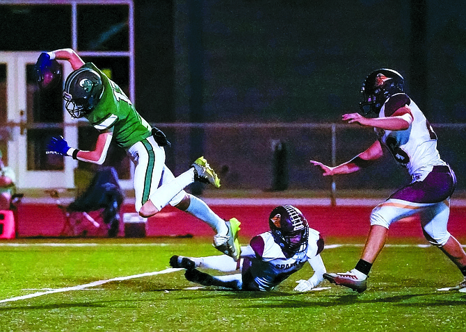 Fallon running back Deonte Wallace lunges for the end zone Friday against Sparks.