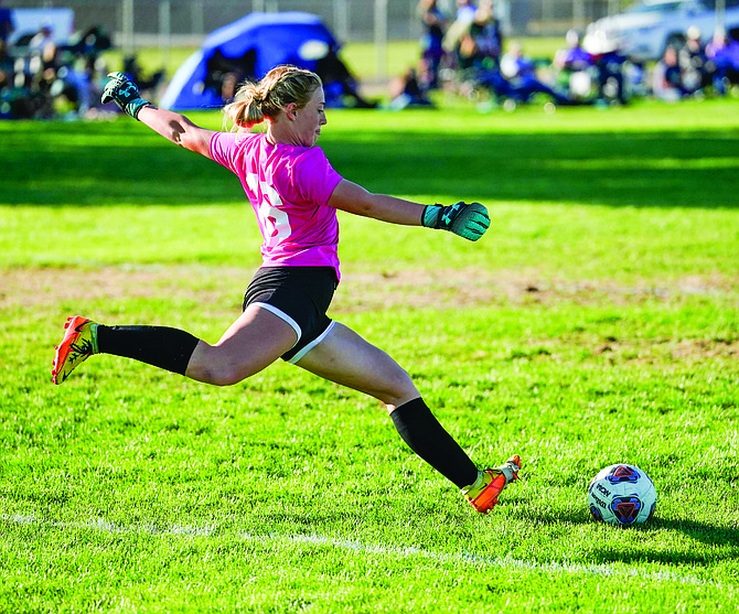 Fallon senior Ambreea Snodgrass clears the ball in Fallon’s shutout win over Lowry.