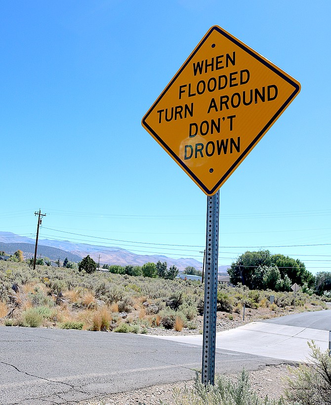 The dip at Calle Pequeno is usually overtopped by flooding on Pine Nut Creek in Fish Springs.