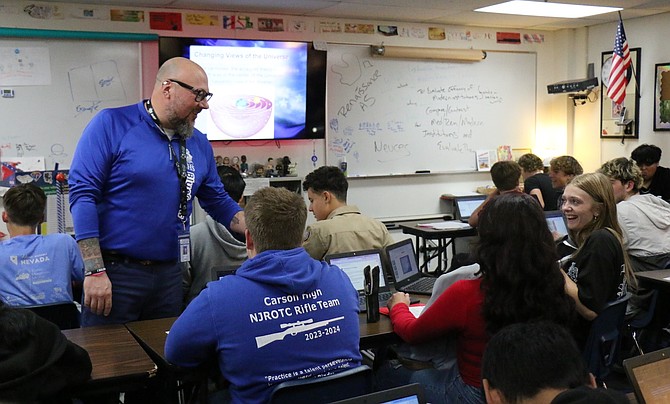 Carson High School world history teacher Ben Spence helps students Sept. 24, 2024 as they work on an assignment.