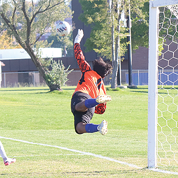 Lowry’s Izayus Barajas makes a save on a Churchill County shot.