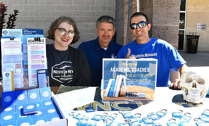 Western Nevada College President J. Kyle Dalpe, center, participates in the club and career fair earlier this month.