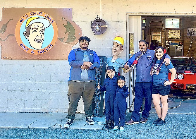 Nephew Davian, Kahlea, Joniko, Tony Garcia and Sayra Chavez of Alpine Mobile Deisel in front of their Markleeville shop. Photo by Lisa Gavon