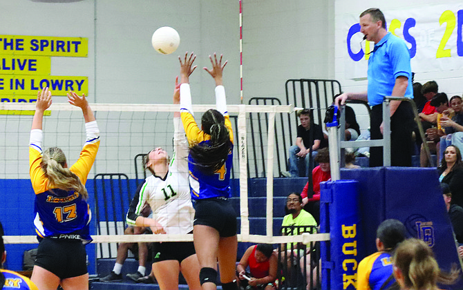 Fallon’s Sutton Yost attacks the ball against Lowry in Friday’s league match in Winnemucca.