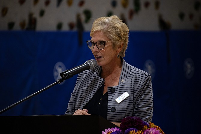 Boys & Girls Clubs of Snohomish County Chief Operating Officer Marci Volmer speaks at the grand opening of the Richard Boyden Teen Center in the Snohomish Boys & Girls Club Sept. 25.