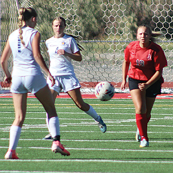 Pershing County's Grace Kalsem competes against Lowry on Tuesday, Sept. 24, in Lovelock.