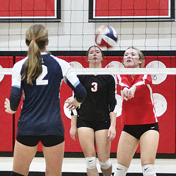 Sophomore libero Arya Garland controls the back court at Pershing’s homecoming game against Oasis Academy.