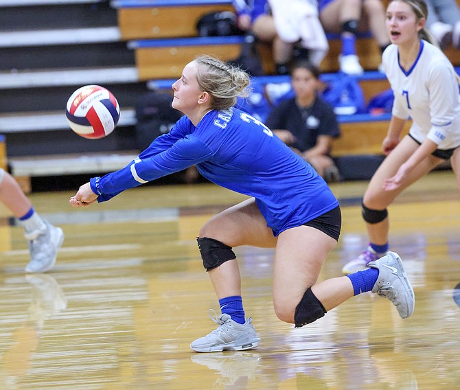 Carson High senior Ava Kordonowy gets low for a dig against Spanish Springs on Thursday. The Senators fell in five sets to the Cougars.