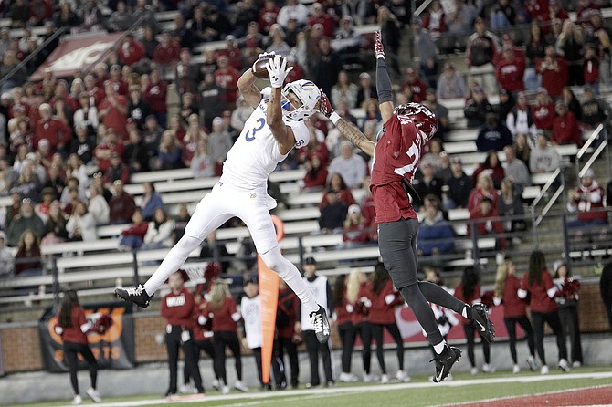 San Jose State receiver Nick Nash (3) catches a pass for a touchdown while covered by Washington State’s Ethan O'Connor on Sept. 20.