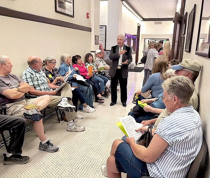 Johnson Lane resident Jim Jackson stands in the hallway outside commission chambers in the Douglas County Courthouse as residents wait a turn to speak on Thursday afternoon.
Photo special to The R-C by Ellie Waller