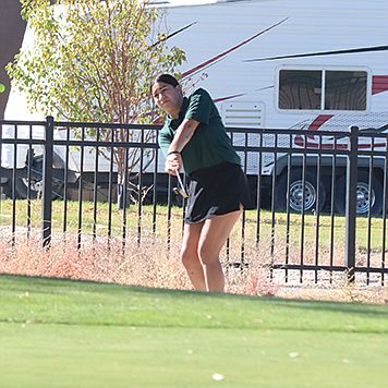 Battle Mountain’s Kiana Gonzales chips on the second green during last Thursday’s 2A tournament in Battle Mountain.