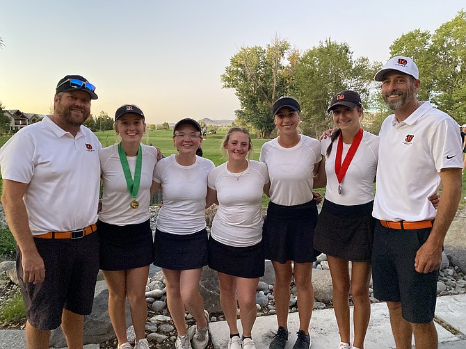 The Douglas High School girls golf team is headed to the state tournament for the fourth consecutive season. Pictured from left to right are coach JD Frisby, Madison Frisby, Adrianna Nuno, Kailynn Dollar, Morgan Gooch, Giana Zinke and coach Markus Zinke.