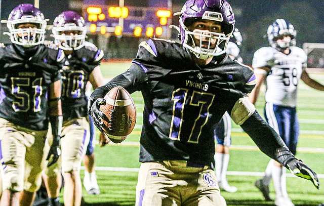 Viking senior Layshon Limar strolls into the end zone late in the first half with one of his three rushing touch downs as Lake Stevens continued their state champion-style winning streak, defeating the up-to-then undefeated Glacier Peak Grizzlies 31 - 10 on a crisp Friday evening Oct. 4 in Lake Stevens.  The Vikings used a strong ground game and precise passing to win. With one TD recalled, the Vikings made a gutsy call on 4th down and converted with a good run. The Vikings Defense came alive in the second period, harassing and sacking the Grizzly QB. There were many penalties noticed during this and previous games, sometimes resulting in called back TDs and long losses of yardage and first downs.