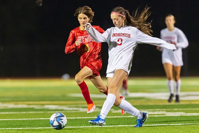 Snohomish Panthers defender/midfielder, freshman Kennedy Perasso charges on the field with Marysville-Pilchuck forward, freshman Sydney Schute running astride. 
Snohomish won 5-0 on Marysville-Pilchuck’s field on Thursday, Oct. 3. 
The Panthers currently lead girls soccer in Wesco 3A North at 
5-0 league, 6-2 overall as of press time Monday, Oct. 7. Marysville-Pilchuck was 1-4 league, 2-6 overall. Monroe stands second in the league at 3-1.