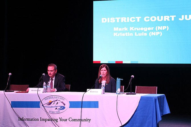 First Judicial District Court Department 2 Judge Kristin Luis, right, debates Carson City attorney and challenger Mark Krueger during a public forum at the Brewery Arts Center on Oct. 9, 2024.