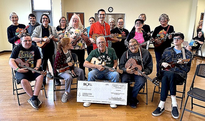 Expand-Able Horizons received a $10,000 grant from the Silicon Valley Community Foundation. Participants and volunteers at the Dance/Ukulele Class celebrate the news. Photo by Joyce C. Meyer.