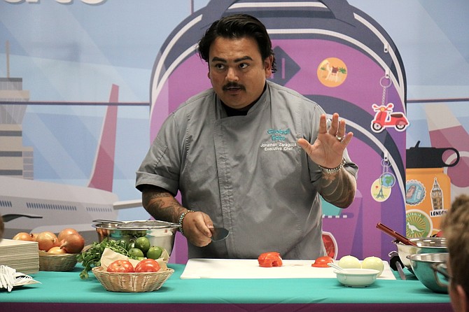 Chef Jonathan Zaragoza provides a demonstration to Carson Middle School culinary arts students last week about making pico de gallo and skills in the kitchen.