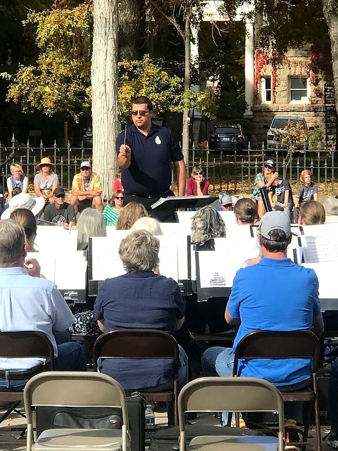 Nick Jacques directs the Capital City Community Band on Nevada Day.