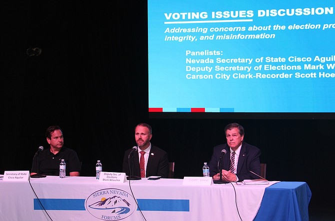 From left, Nevada Secretary of State Cisco Aguilar, Nevada Deputy Secretary of Elections Mark Wlaschin and Carson City Clerk-Recorder Scott Hoen at a public forum at Brewery Arts Center Monday.