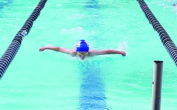 Weston Reiva of the Battle Mountain NNA swim team competes in Roseville, Calif.