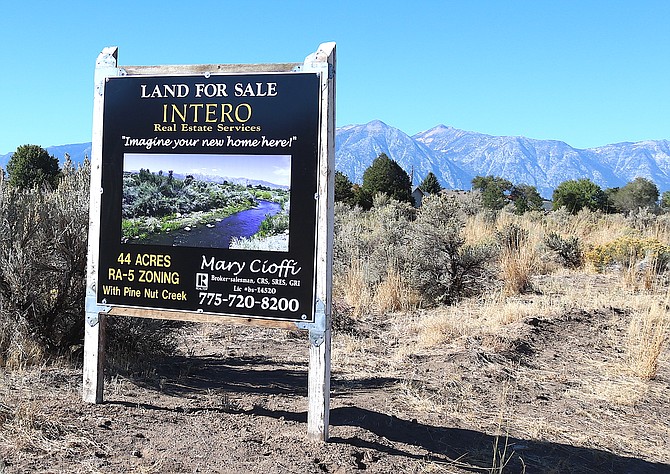 A real estate sign along Jacobsen Lane in Fish Springs for a 44-acre parcel pending sale.