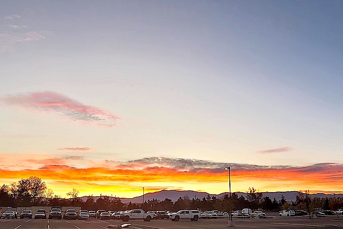 Sunrise over the Pine Nuts from Minden this morning indicates there might be some weather on the way. Photo special to The R-C by Pat Griffin.