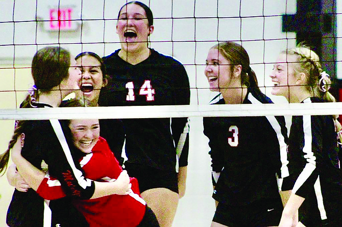 Kyra Cerini's teammates celebrate her block against North Tahoe. From left to right: Kyra Cerini, Mia Canchola, Arya Garland, Aaliyah Allen, Raegan Burrows and Khloe Montes.