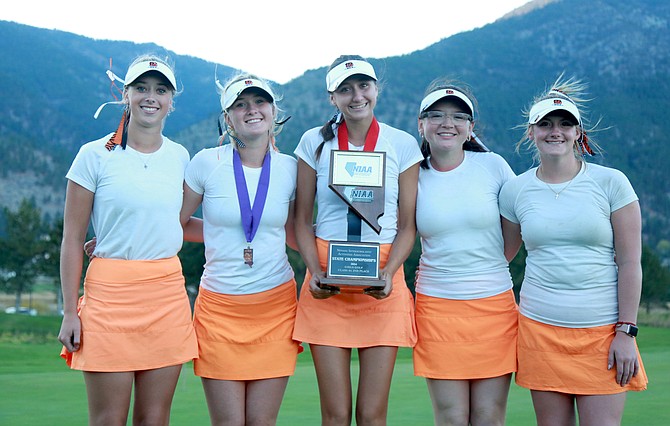 The Douglas High School girls golf team poses with the Class 4A state runner-up trophy. Pictured, from left: Morgan Gooch, Madison Frisby, Giana Zinke, Adrianna Nuno and Kailynn Dollar.